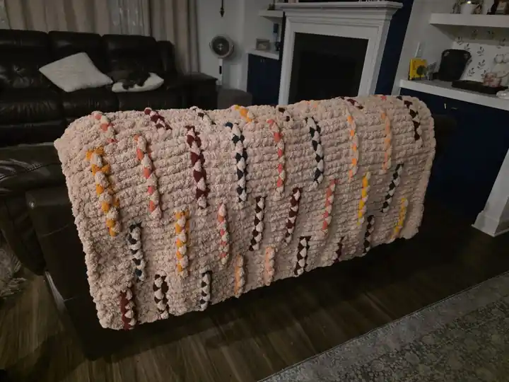 Customer-made cream chunky knit blanket with gold and brown flecks