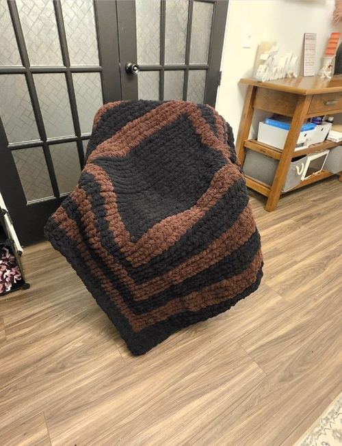 Finished Midnight Mocha chunky-knit blanket made by a ChunkyGrid customer